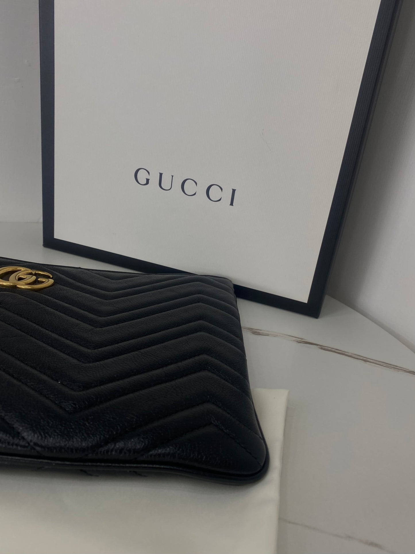 Pochette Gucci Marmont GG